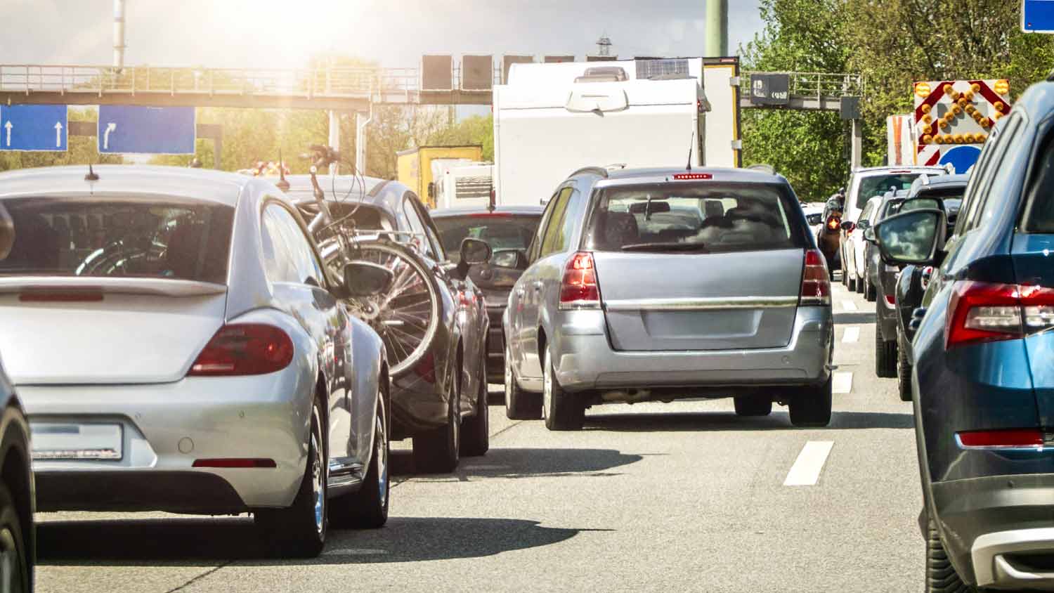 a car trying to merge into a lane